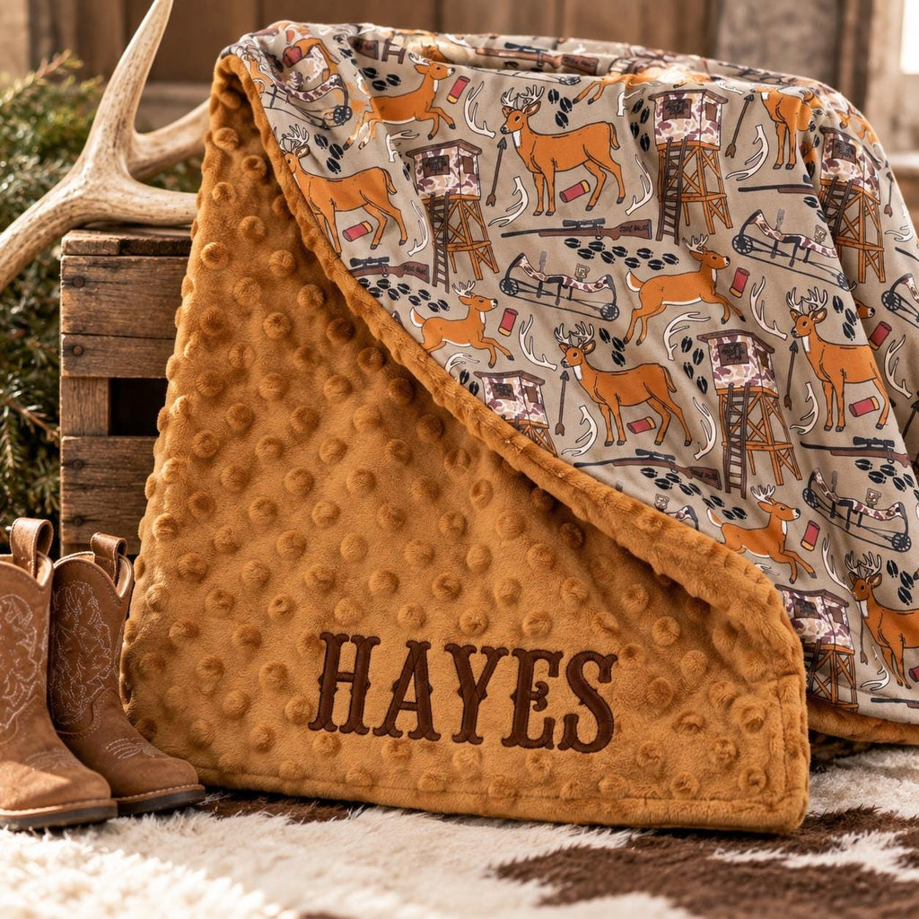 Personalized hunting baby blanket with deer print and copper minky backing