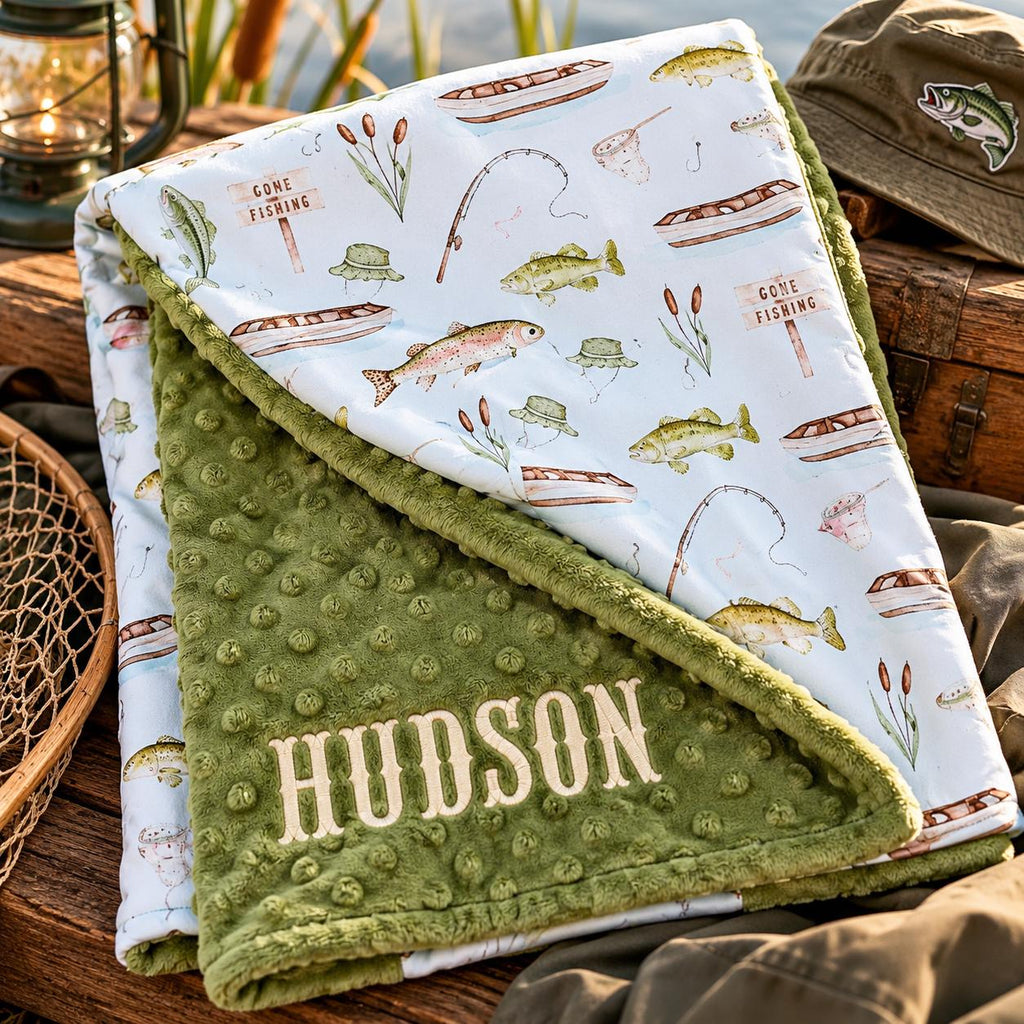Personalized fishing baby blanket with embroidered name and olive green minky backing